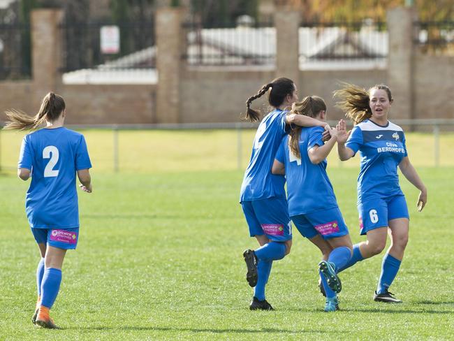 South West Queensland Thunder players celebrate a goal by Madison Franke (centre) against The Gap FC in NPL Queensland women round 26 football at Clive Berghofer Stadium, Saturday, August 25, 2018.