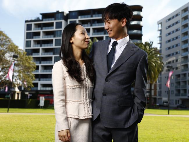 WEEKEND TELEGRAPHS SPECIAL JULY 25, 2024, PLEASE CONTACT WEEKEND PIC EDITOR JEFF DARMANIN BEFORE PUBLISHING..Lidcombe is set to have the second most new home stock coming to market in Sydney. Inki Yun (right) and his partner Soyeon Jeon have purchased a new home at Lidcombe Central. Pictured at Remembrance Park around the corner from where their new unit is being built. Picture: Jonathan Ng