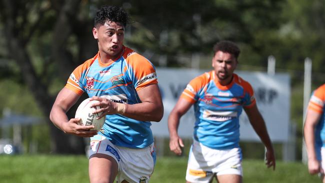 Pride's Jonah Rameka builds up a head of steam in the Round 2 match of the Lightning Challenge between the Northern Pride Reef Kings and the Tully Tigers, held at Stan Williams Park. PICTURE: BRENDAN RADKE