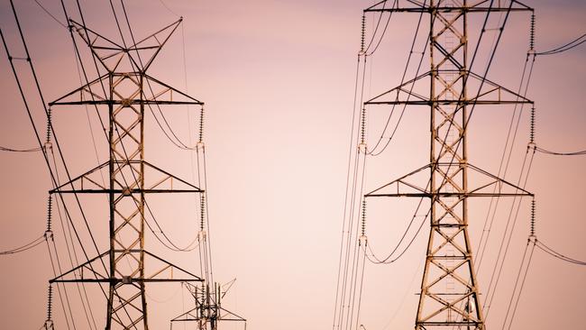 Massive power lines stretch into the distance