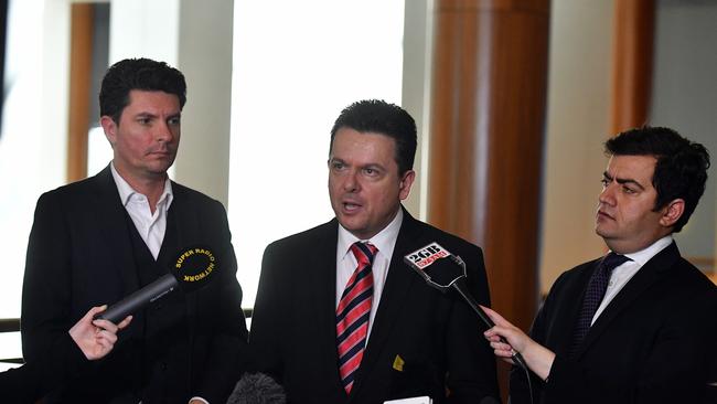 Scott Ludlum, Nick Xenophon (centre) and Sam Dastyari (right) proposed a levy on Google and Facebook. Picture: AAP/Mick Tsikas