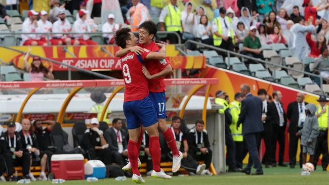 South Korea's Cho Young Cheol celebrates scoring the only goal of the game.