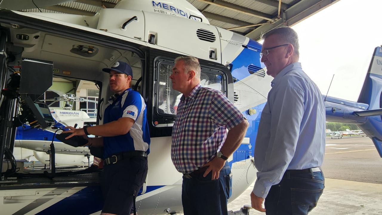 Queensland government ministers inspect the new POLAIR craft that will operate in Townsville earlier this year. Far North Labor MPs are lobbying for a similar asset to be based in Cairns.