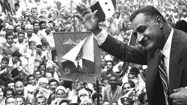 Egyptian president Gamal Abdel Nasser waving to the crowds in Mansoura on May 7, 1960