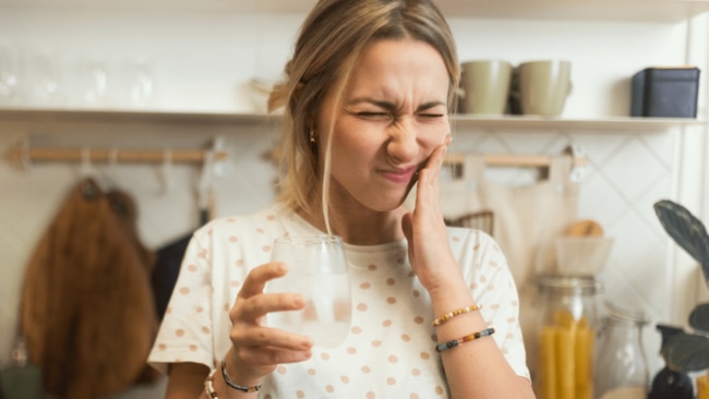 Those with a misaligned bite, old fillings or crowns, tooth demineralisation or genetic dental issues have a greater risk of damage from chewing on hard things such as ice. Image: iStock