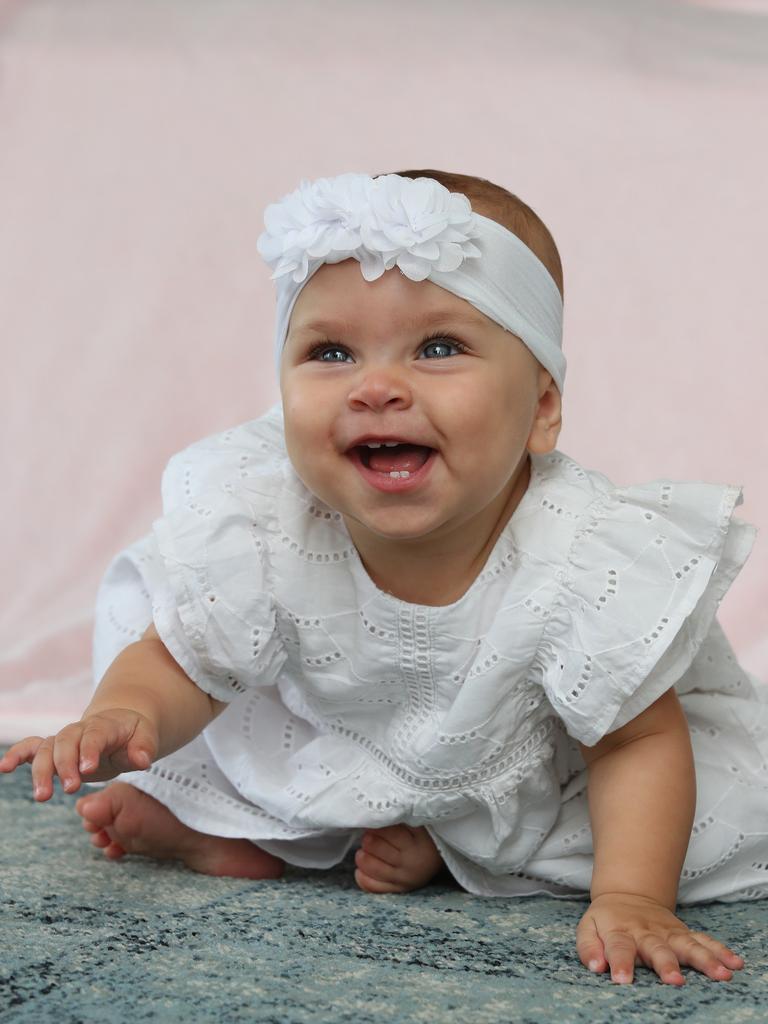 Aryana Bishop was the Gold Coast's runner up cutest baby, and its easy to see why. Aryana at her Pimpama home and also with mum Samantha Bishop. Picture Glenn Hampson