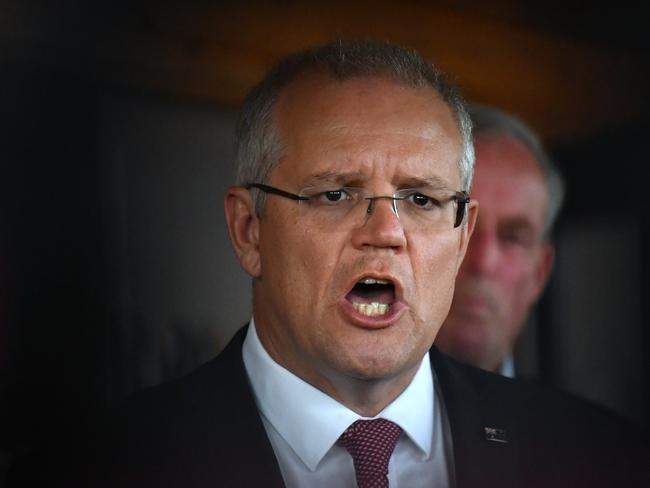 Prime Minister Scott Morrison at a press conference at an ice cream parlour, 40km south of Devonport in Tasmania, Tuesday, April 17, 2019. (AAP Image/Mick Tsikas) NO ARCHIVING