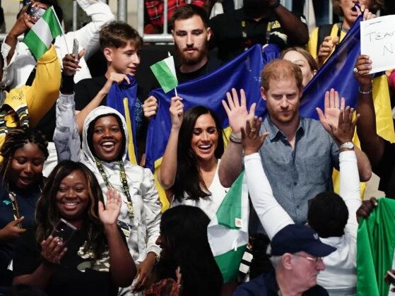 Prince Harry and Meghan Markle get into the spirit of the Invictus Games. Picture: Supplied