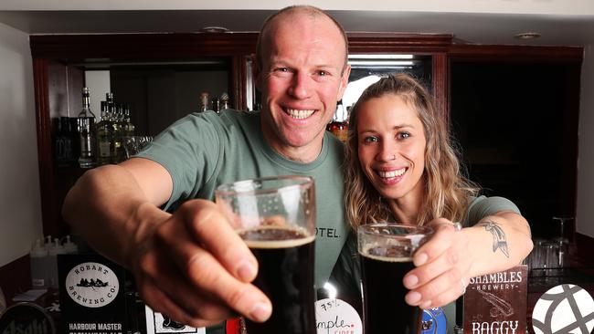 Paul Stewart and Sarah James bar staff at the Crescent Hotel that has re-opened in North Hobart.  Picture: NIKKI DAVIS-JONES