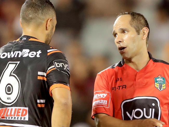 SYDNEY, AUSTRALIA - MARCH 23:  Referee Ashley Klein talks to Tigers Captain Benji Marshall after he awarded a penalty to the Broncos in Golden Point extra time during the round three NRL match between the Wests Tigers and the Brisbane Broncos at Campbelltown Sports Stadium on March 23, 2018 in Sydney, Australia.  (Photo by Mark Evans/Getty Images)