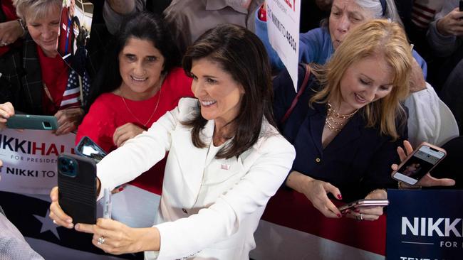 Former US ambassador to the UN Nikki Haley poses for a selfie with a crowd of supporters in Charleston, South Carolina. Picture: AFP