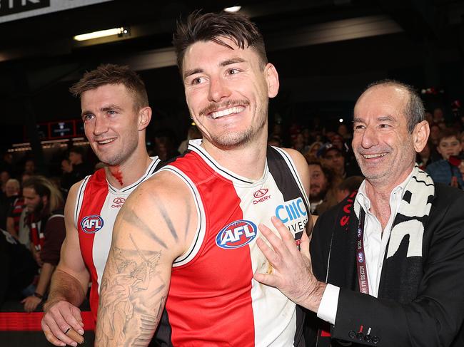 MELBOURNE, AUSTRALIA - JULY 07: Andrew Bassat, President of St Kilda Football Club celebrates with Josh Battle of the Saints during the round 17 AFL match between St Kilda Saints and Sydney Swans at Marvel Stadium, on July 07, 2024, in Melbourne, Australia. (Photo by Kelly Defina/Getty Images)