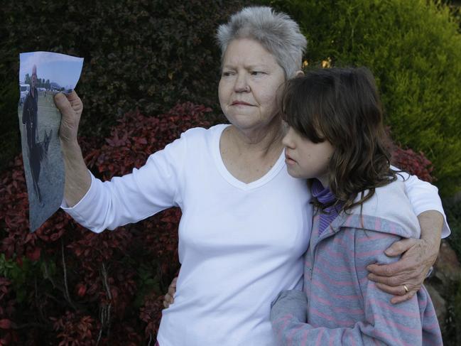 Bob’s wife Jeanette Knight and her granddaughter Alli with a picture of Bob. File picture