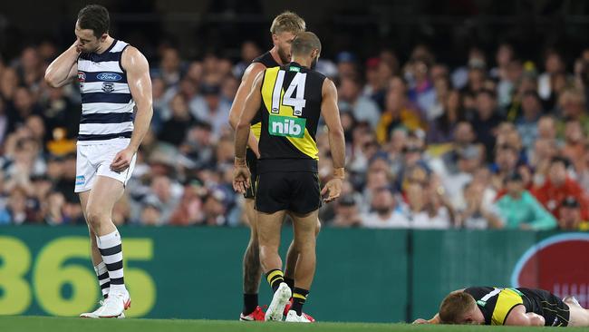 Patrick Dangerfield checks his elbow after a run-in with Nick Vlastuin that left Vlastuin concussed. Picture: Michael Klein