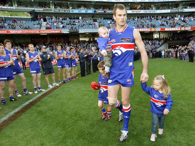 Rostrevor old scholar Luke Darcy walks onto Etihad Stadium in 2007 for his final game. Picture: Michael Klein.