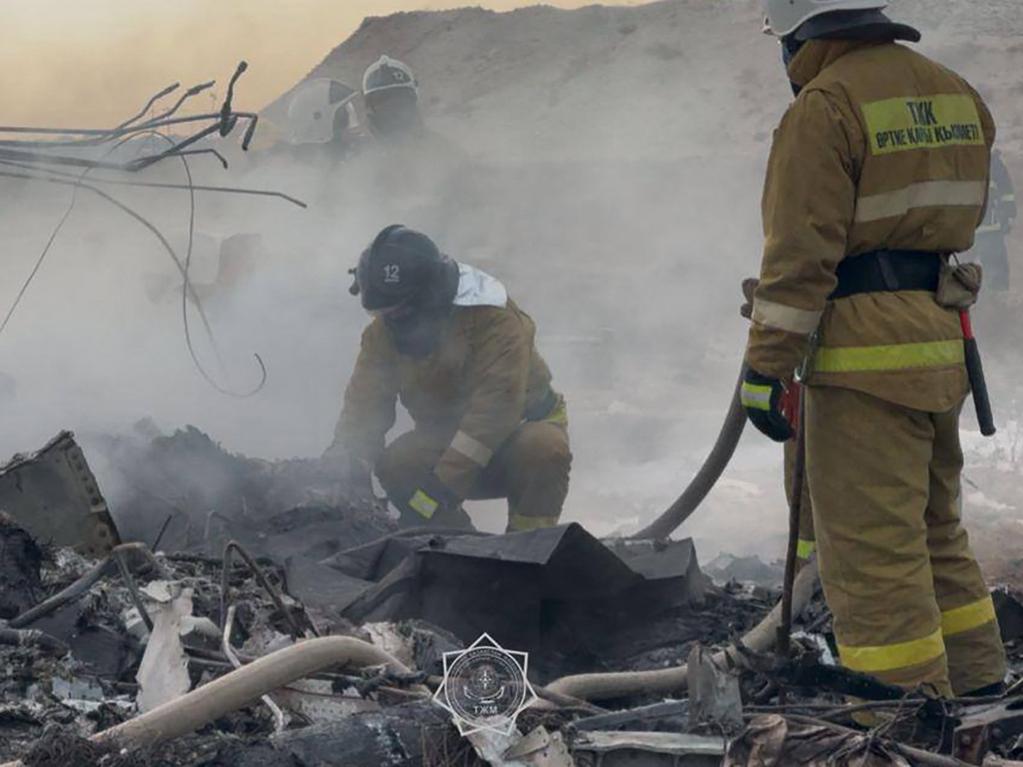 Kazakhstan's emergency workers at the crash site on December 25, 2024. Picture: Kazakhstan's emergency situations ministry / AFP.