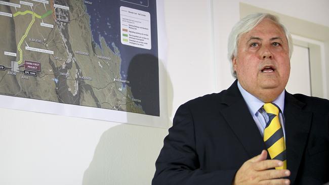 Clive Palmer, chairman of Mineralogy Pty, speaks in front of a map showing the Galilee Basin area of Queensland during a news conference in Brisbane, Australia, on Wednesday, Feb. 1, 2012. Palmer is planning an $8 billion China First coal project in the Galilee Basin. Photographer: Patrick Hamilton/Bloomberg *** Local Caption *** Clive Palmer
