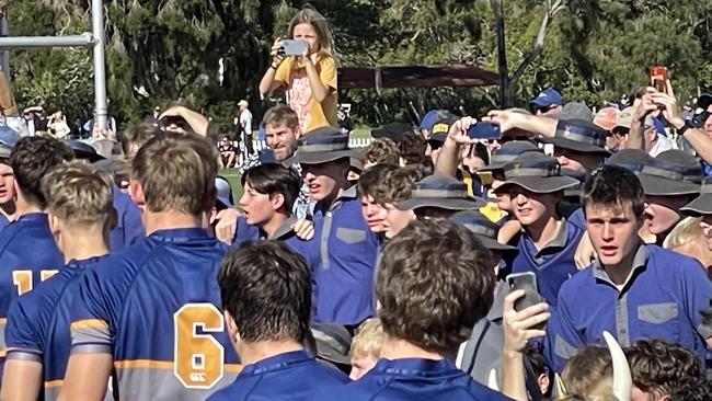 Churchie supporters cheer their side on.