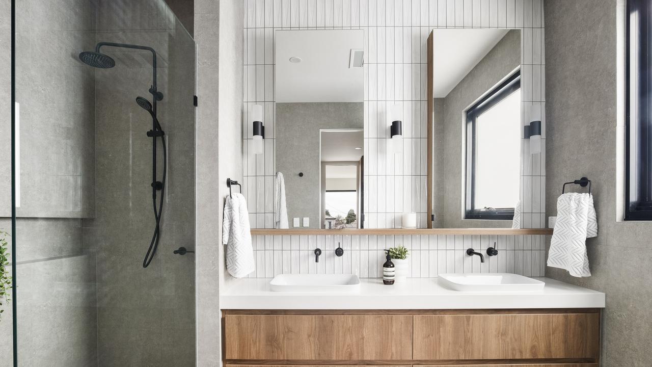 All three of the home’s luxe bathrooms feature high-end finishes.