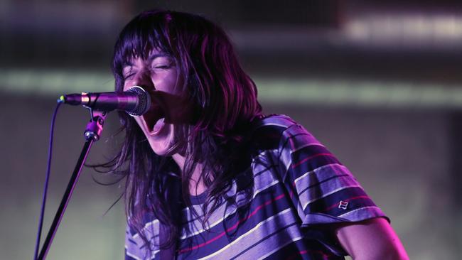 AUSTIN, TX - MARCH 19: Courtney Barnett preforms at Tumblr IRL Presents Courtney Barnett At SXSW, With Art By Traceloops, Wolf Mask &amp; Ana Tortos on March 19, 2015 in Austin, Texas. (Photo by Robin Marchant/Getty Images for Tumblr)