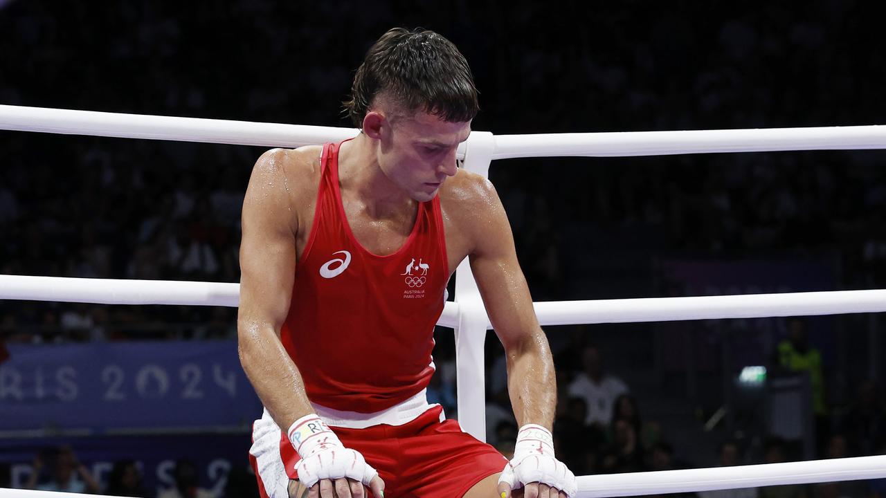 Harry Garside sits on the ropes after his unanimous decision loss. Picture: Michael Klein