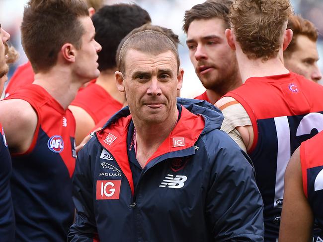 MELBOURNE, AUSTRALIA - AUGUST 10: Demons head coach Simon Goodwin walks away from talking to his players during the round 21 AFL match between the Melbourne Demons and the Collingwood Magpies at Melbourne Cricket Ground on August 10, 2019 in Melbourne, Australia. (Photo by Quinn Rooney/Getty Images)