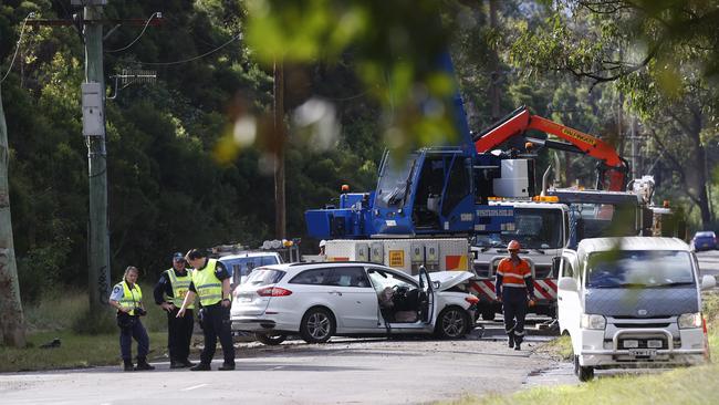 Emergency services at the scene. Picture: Richard Dobson