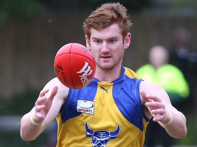 Ryan Morrison of Noble Park leads Jake Hammond of Blackburn to the ball during the EFL Division 1 match between Blackburn and Noble Park played at Morton Park on Saturday, July 8, 2017 in Blackburn, Victoria, Australia.Picture: Hamish Blair