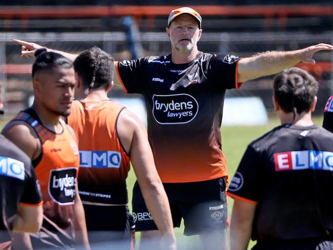 DAILY TELEGRAPH - 18 NOVEMBER, 2021. Wests Tigers hold a closed training session at Leichardt Oval with the full squad back for their first full training run together. Coach Michael Maguire (C) gives direction to the players. Picture: Toby Zerna