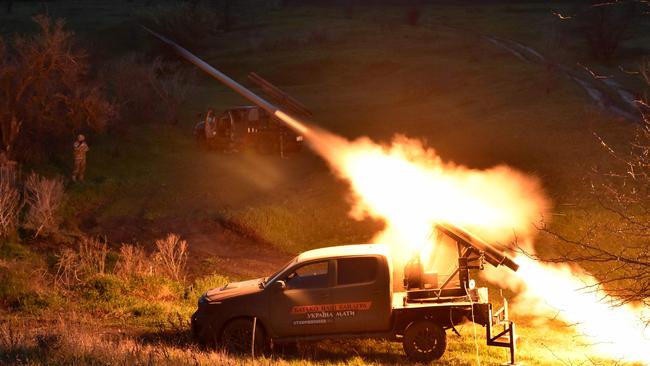 Ukrainian servicemen fire a mobile MLRS (Multiple Launch Rocket System) at an undisclosed location on the front line in Zaporizhzhia region. Picture: Ukrainian Armed Forces / AFP