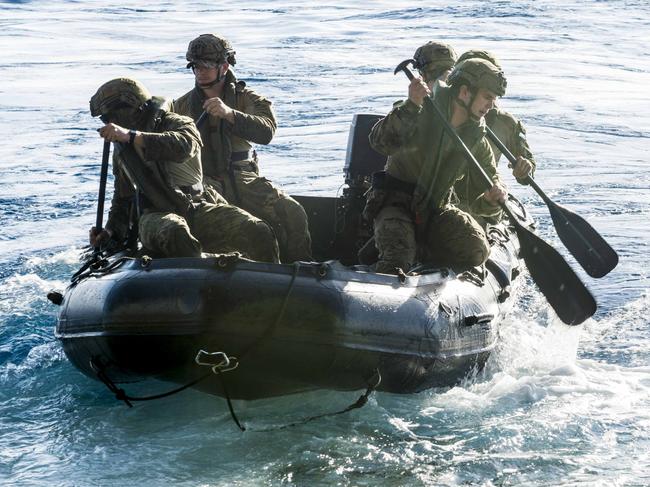 File photo: Soldiers, assigned to 2nd Battalion, The Royal Australian Regiment, depart the well deck of the amphibious transport dock USS Green Bay (LPD 20) in a combat rubber raiding craft as a part of an amphibious assault raid exercise during Talisman Sabre 2017. Picture: Sarah Myers/US Navy