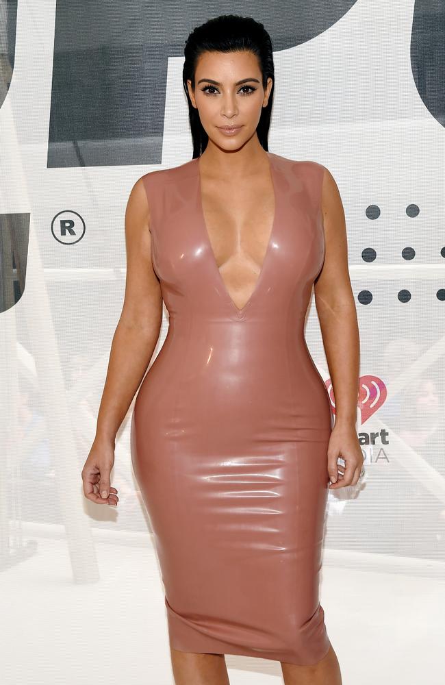 Wearing nothing less than a skin-tight flesh-toned PVC pencil dress Kim Kardashian West attends the Hype Energy Drinks U.S. Launch on June 2, 2015 in Nashville. Picture: Getty