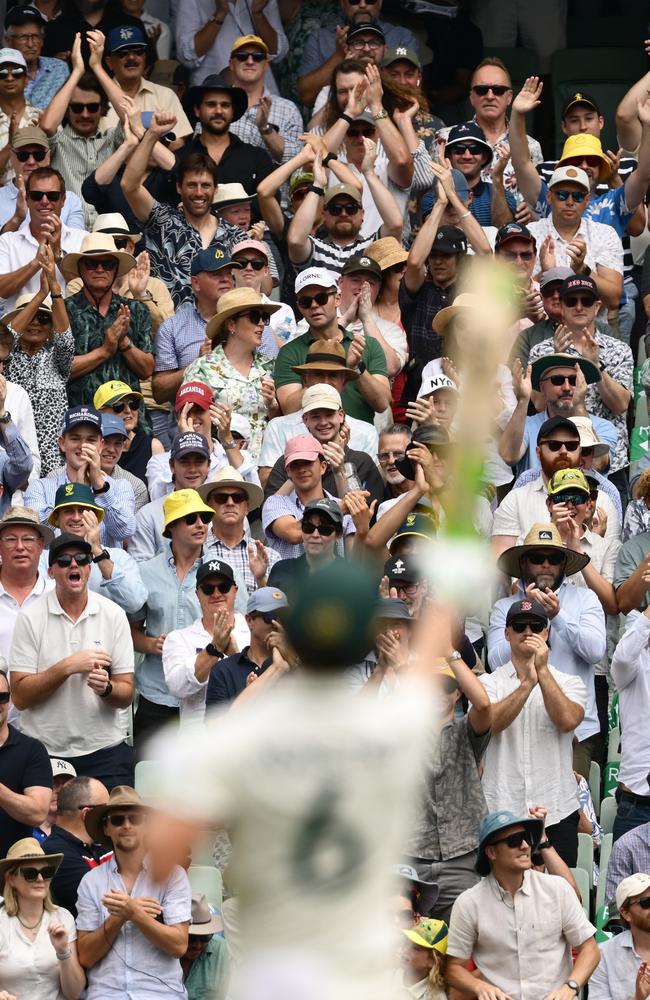 Aussie fans applaud a new hero. Picture: Quinn Rooney/Getty Images