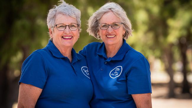 Twin sisters Patty Powell and Eileen Giles, right, have been honoured for their charity work. Picture: AAP