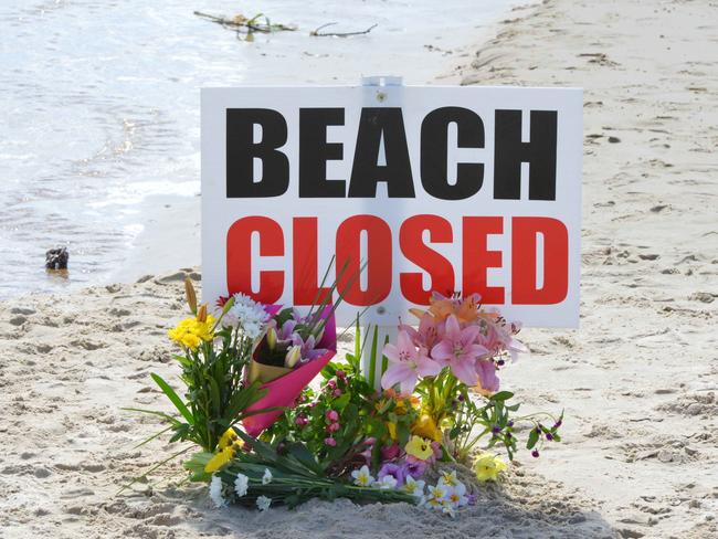 A flower memorial at Shelly Beach for Japanese surfer Tadashi Nakahara / Picture: Brian Pamphilon