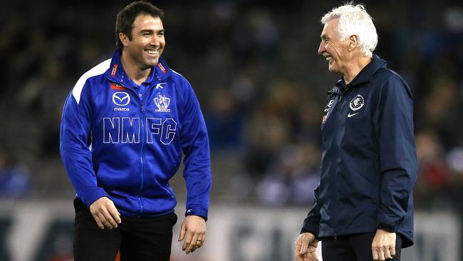 Brad Scott and Mick Malthouse as rival coaches. Picture: Wayne Ludbey