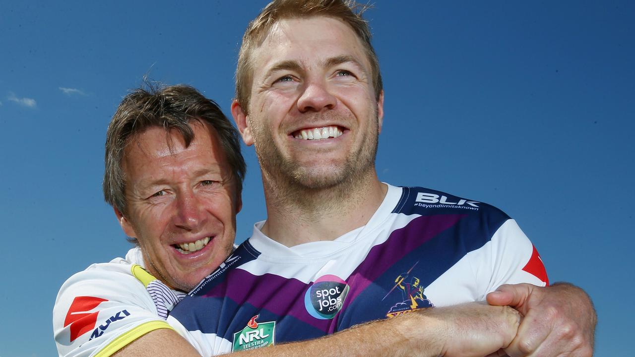 Craig Bellamy cuddles Ryan Hinchcliffe in 2015. Picture: Colleen Petch.