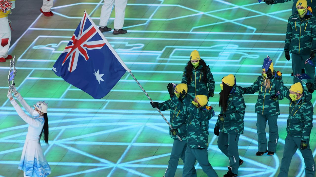 Flag bearers Brendan Kerry and Laura Peel lead the Australian team at the Opening Ceremony of the Beijing 2022 Winter Olympics. Picture: Matthew Stockman/Getty Images)