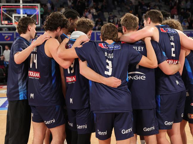 Melbourne United players celebrate the win. Picture: Kelly Defina/Getty