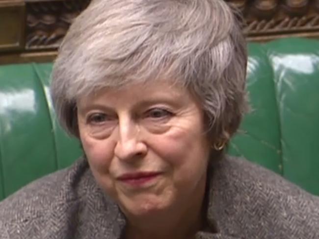 A video grab from footage broadcast by the UK Parliament's Parliamentary Recording Unit (PRU) shows Britain's Prime Minister Theresa May (L) listening as opposition Labour Party leader Jeremy Corbyn (not pictured) announces that he will table a motion of no confidence in Theresa May, in the House of Commons in London on December 17, 2018, following her statement on her attendance at an EU Summit last week. - Prime Minister Theresa May will on Monday warn MPs against supporting a second Brexit referendum, as calls mount for a public vote to break the political impasse over the deal she struck with the EU. "Let us not break faith with the British people by trying to stage another referendum," she will tell parliament, according to extracts from her speech released by Downing Street. (Photo by HO / PRU / AFP) / RESTRICTED TO EDITORIAL USE - MANDATORY CREDIT " AFP PHOTO / PRU " - NO USE FOR ENTERTAINMENT, SATIRICAL, MARKETING OR ADVERTISING CAMPAIGNS