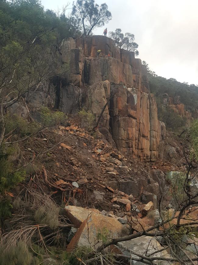 Crews install sensors at Paradise Gorge as clean up begins to reopen the Tasman Highway.