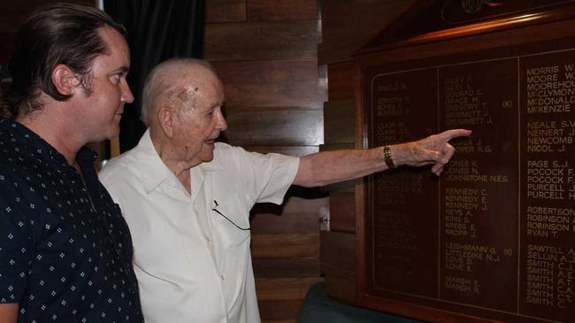 REMEMBERING: Inspecting the restored Roll of Honour Board for 1939-1945 at the Currumbin RSL is Tyson Dolan whose grandfather Stan Dolan is on the board and Dan Waters who is also on the board.