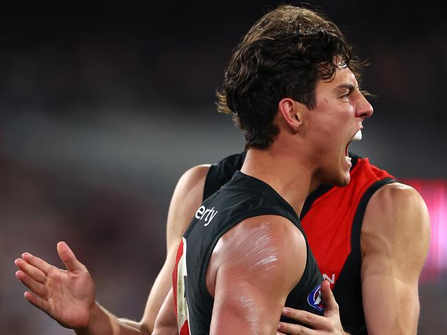 MELBOURNE, AUSTRALIA - JULY 05: Jye Caldwell of the Bombers celebrates kicking a goal during the round 17 AFL match between Collingwood Magpies and Essendon Bombers at Melbourne Cricket Ground, on July 05, 2024, in Melbourne, Australia. (Photo by Quinn Rooney/Getty Images)