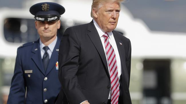 President Donald Trump walks to board Air Force One for the first time. Pic: AP