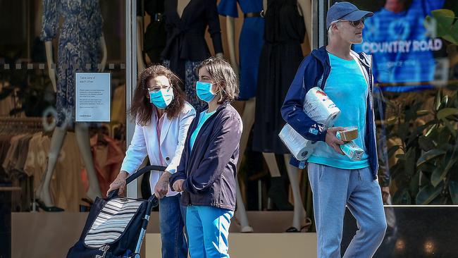 More Melburnians are wearing face masks as the coronavirus outbreak deepens. Picture: Ian Currie