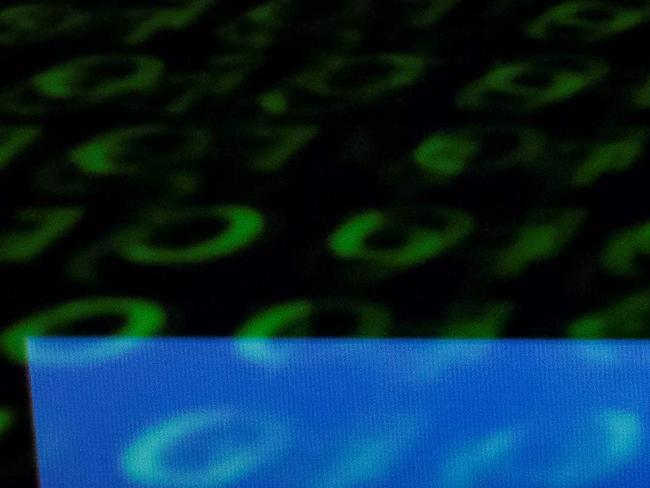 (FILES) This file illustration picture taken on April 28, 2018 shows the logo of social network Facebook displayed on a screen and reflected on a tablet in Paris.  Facebook has asked major US banks to share customer data to allow it to develop new services on the social network's Messenger texting platform, a banking source told AFP on August 6, 2018. / AFP PHOTO / Lionel BONAVENTURE