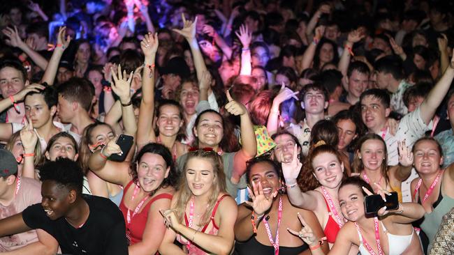 Schoolies partying in the precinct on Sunday night. Picture: AAP Image/Richard Gosling