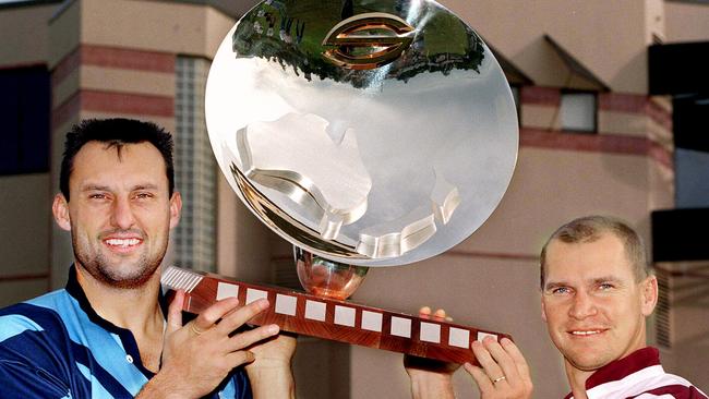 Laurie Daley and Allan Langer hold Super League Tri-Series trophy.