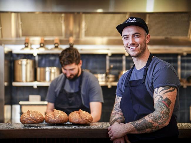 Chef Blake Drinkwater (back) with chef/owner Nathan Sasi. Photo: AAP/Mike Burton