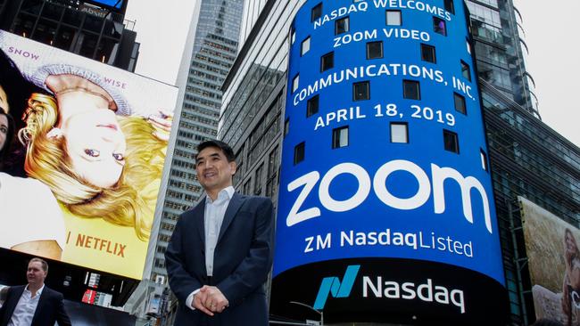 (FILES) In this file photo Zoom founder Eric Yuan poses in front of the Nasdaq building as the screen shows the logo of the video-conferencing software company Zoom after the opening bell ceremony on April 18, 2019 in New York City. - Zoom shares soared on August 31 after the video-meeting service reported that quarterly revenue rocketed as its ranks of users more than quadrupled. (Photo by KENA BETANCUR / GETTY IMAGES NORTH AMERICA / AFP)